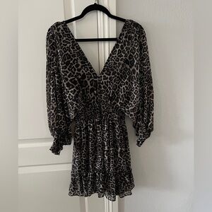 Animal print dress. Sheer but fully lined . absolutely beautiful! New!